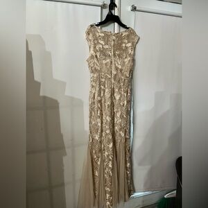 Previously loved and worn Alex evening gown size 6. No snags. 100% polyester